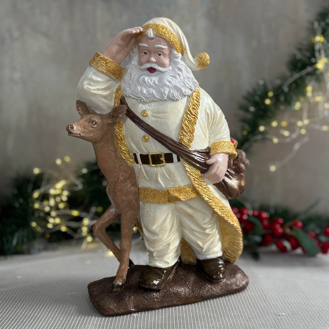Aurora Winter Guardian Santa and Fawn Holiday Sculpture